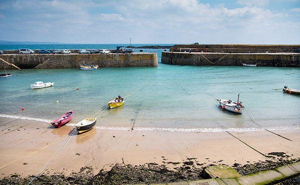 Mousehole harbour on summers day