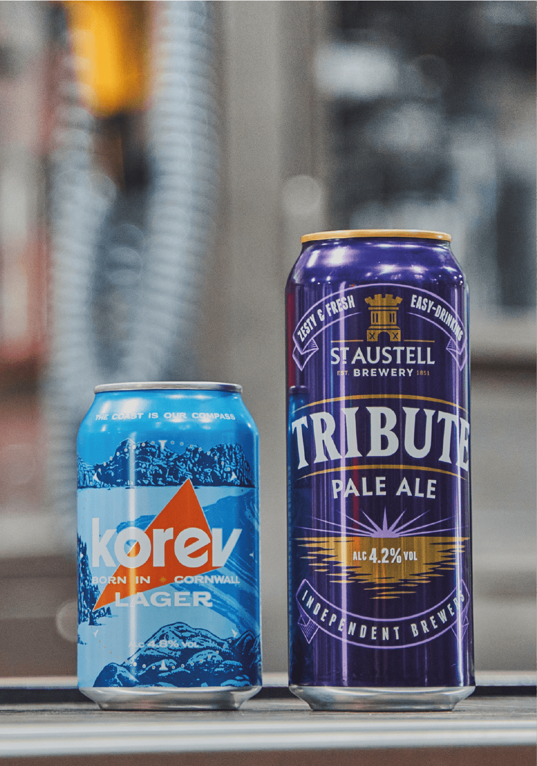Can of korev and Tribute. 